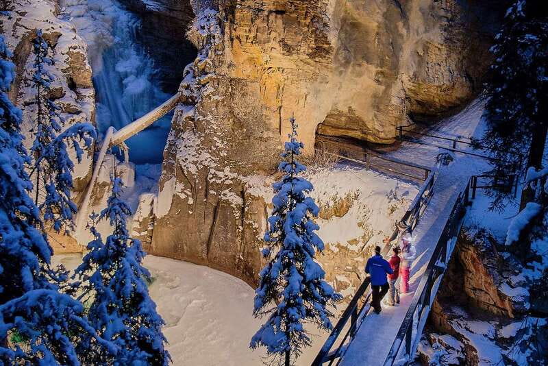 Banff: Johnston Canyon Evening Icewalk - Ice Cleats, Hiking Poles, and Winter-First Safety