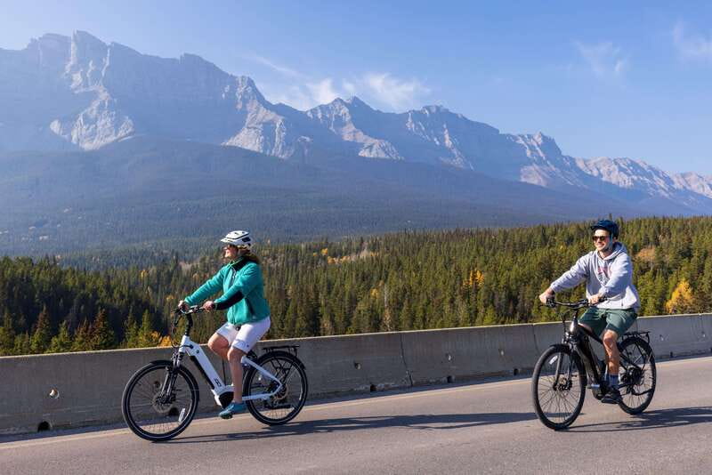 Banff: Mountain Lakeside Guided E-Bike Tour - Entering Banff on a modern e-bike, not a bike headache