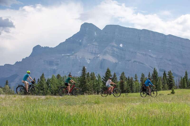 Banff: Mountain Lakeside Guided E-Bike Tour - Lake Minnewanka: flooded-town history and a big-water feeling