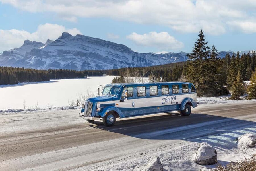 Banff: Winter Tour with Dinner & Nightrise at Banff Gondola - The first photo hits: Two Jack Viewpoint and Lake Minnewanka storytelling