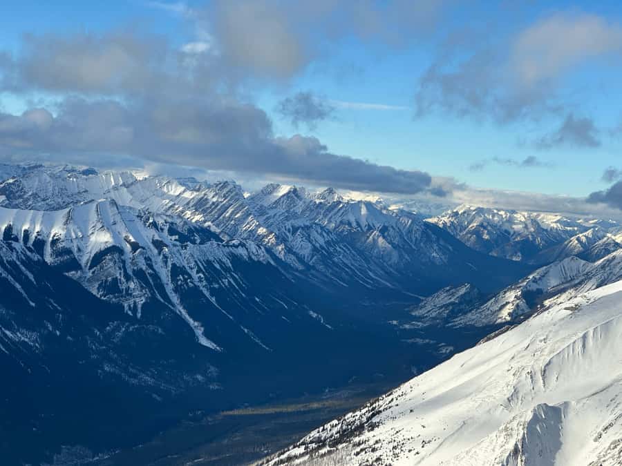 Canmore: 25-Minute Three Sisters Helicopter Tour - Over the Bow River to the Three Sisters: the Canmore skyline moment