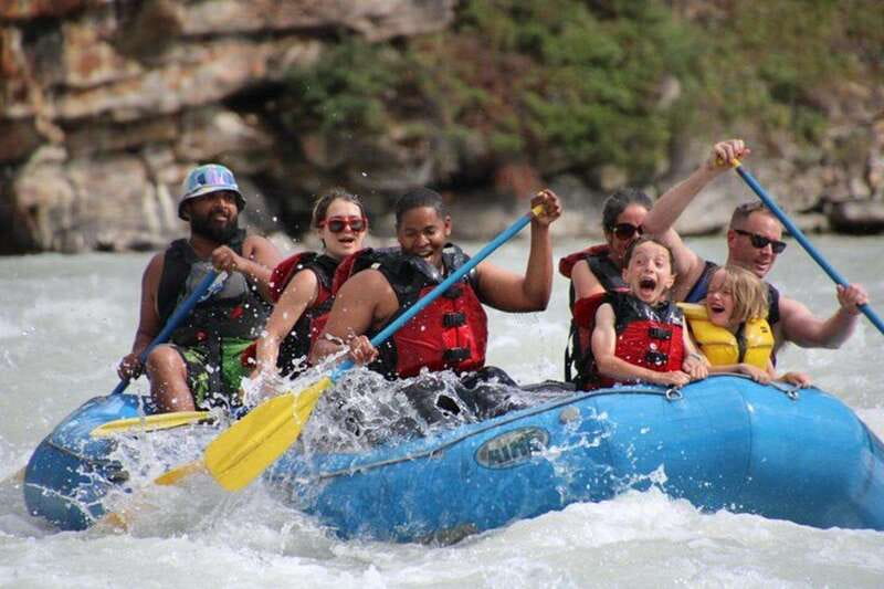 Jasper: Athabasca Falls River Rafting Adventure - Wetsuit gear, safety talk, and that quick portage