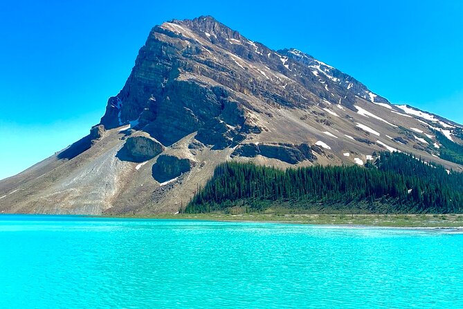 Lake Louise, Moraine Lake and the Icefields Parkway Full-Day Tour - Stop 1: Lake Minnewanka and the Park’s “Underwater” Past